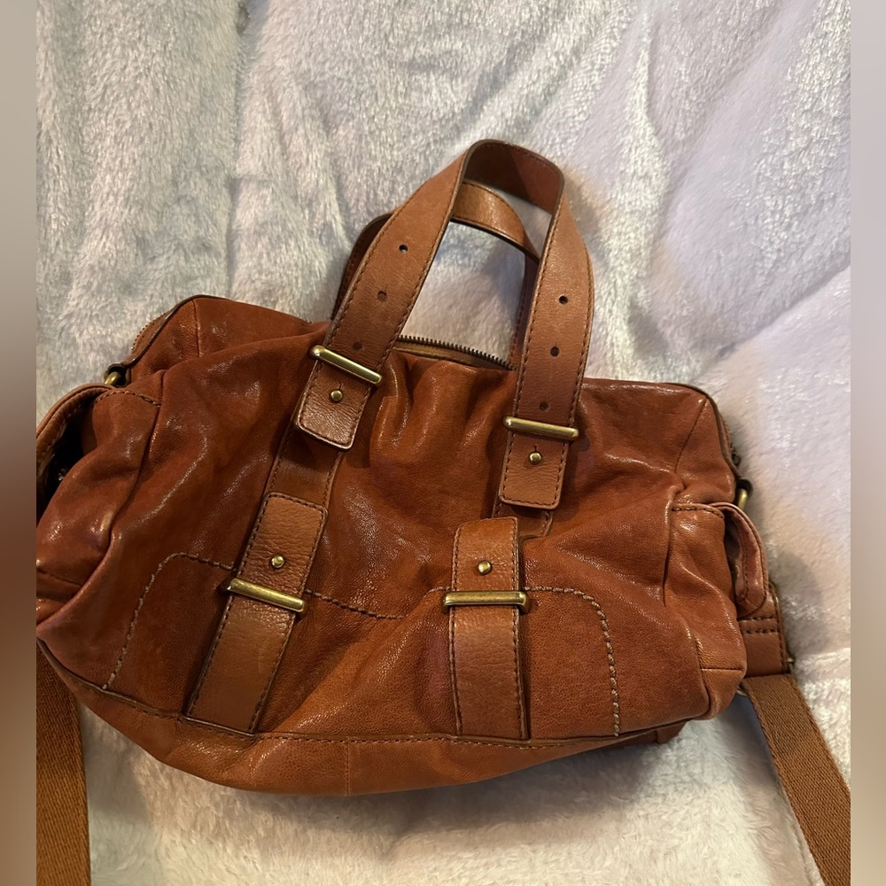 Brown Fossil mini duffel. Width 13.5inch height 7inch